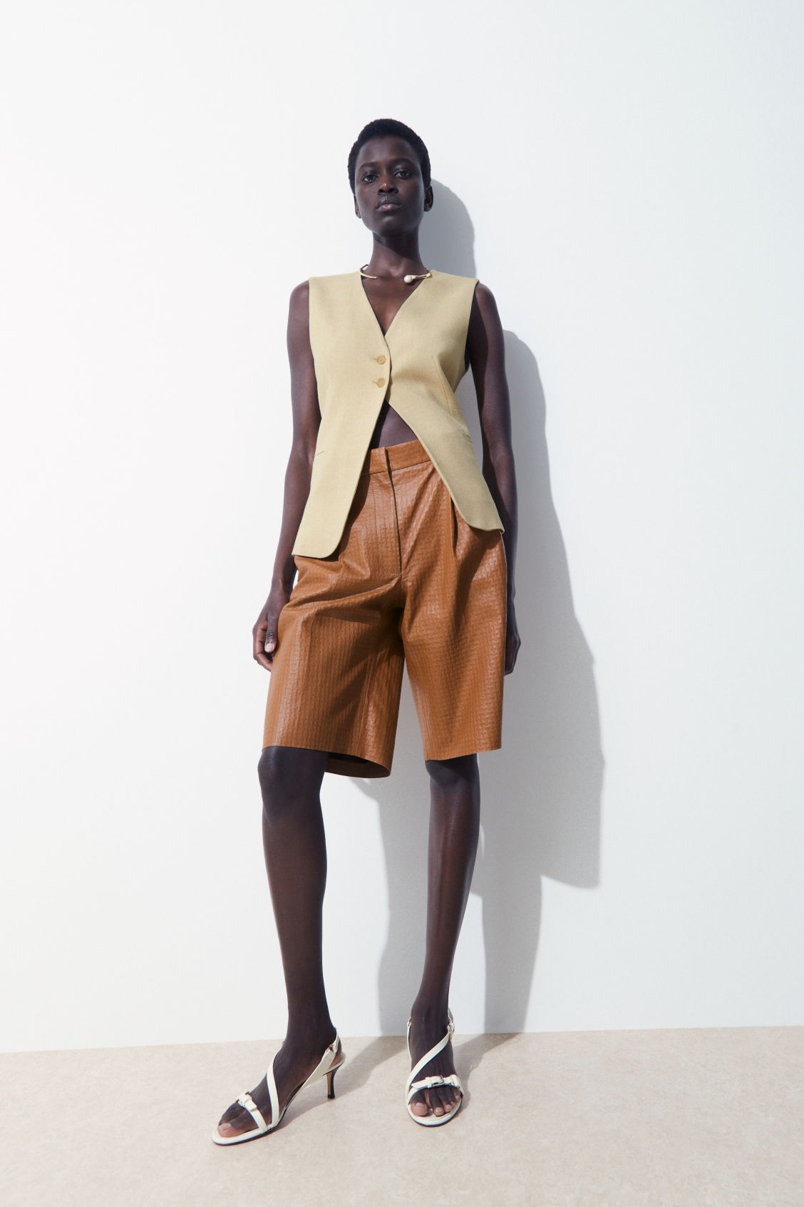 THE EMBOSSED-LEATHER BERMUDA SHORTS, £300, COS