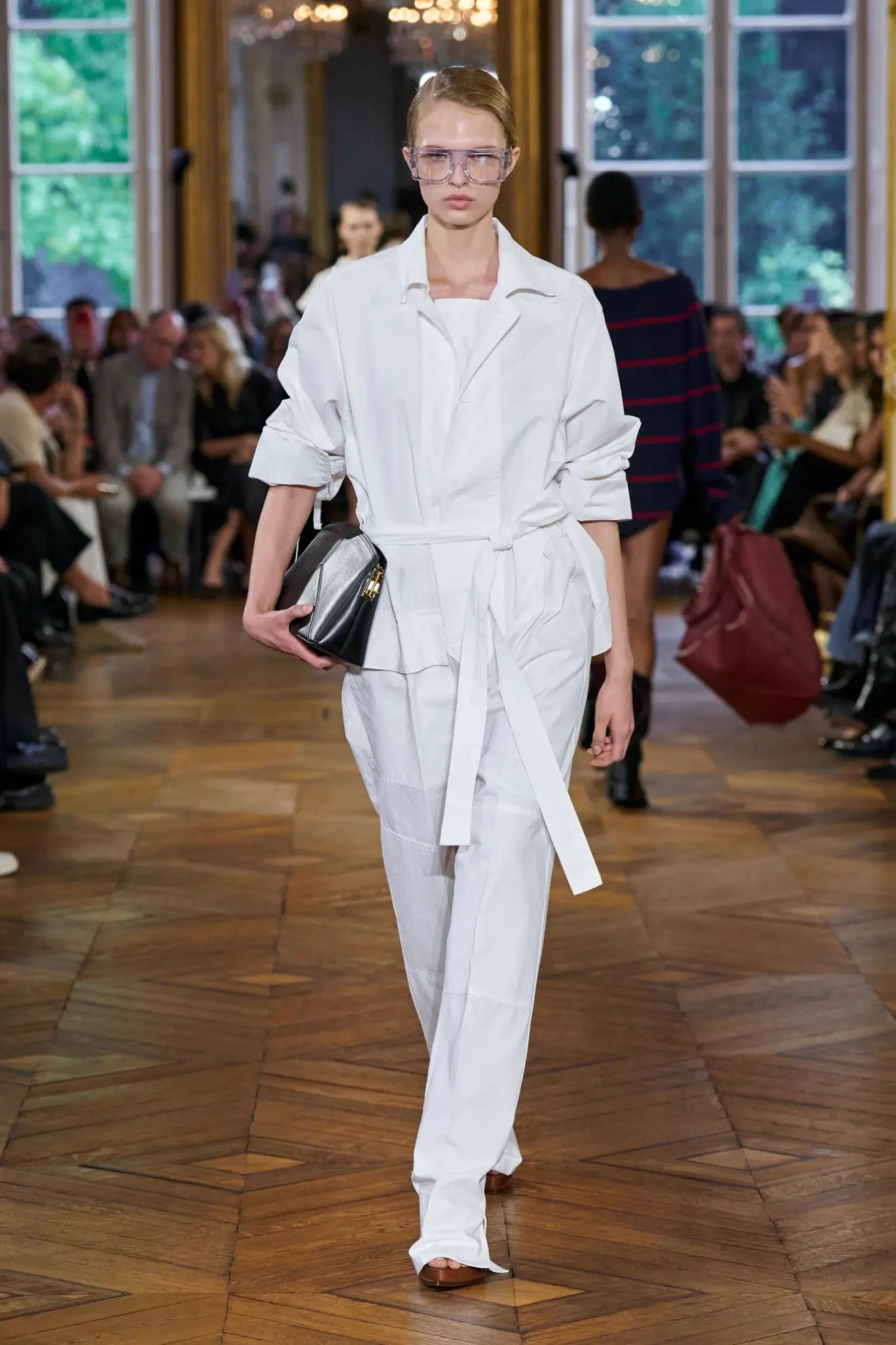 Model wears white outfit on the SS24 Victoria Beckham runway