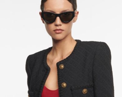 Woman wearing SLM94 cat-eye sunglasses from Saint Laurent