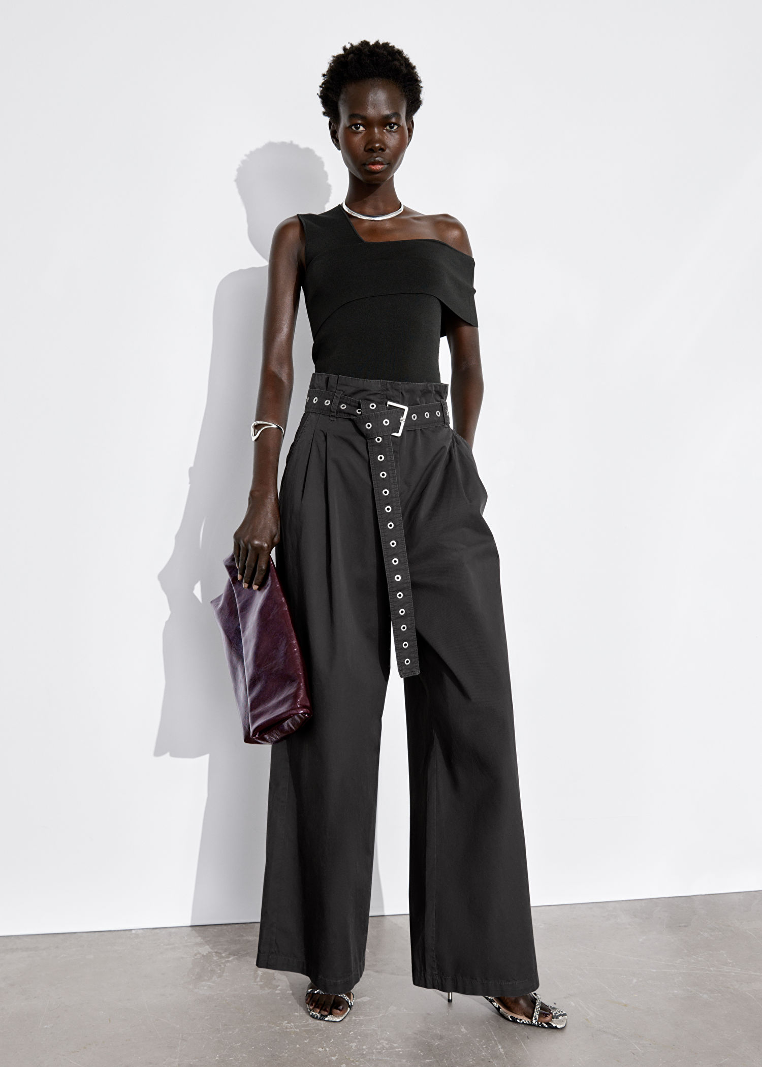 Eyelet-Belt Paperbag Trousers, £97, & Other Stories